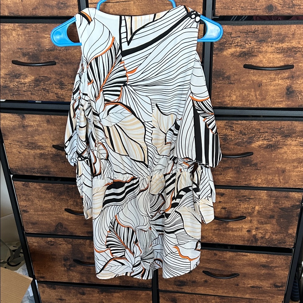 Adelyn Rae Black and Orange Patterned Romper - Picture 7 of 9